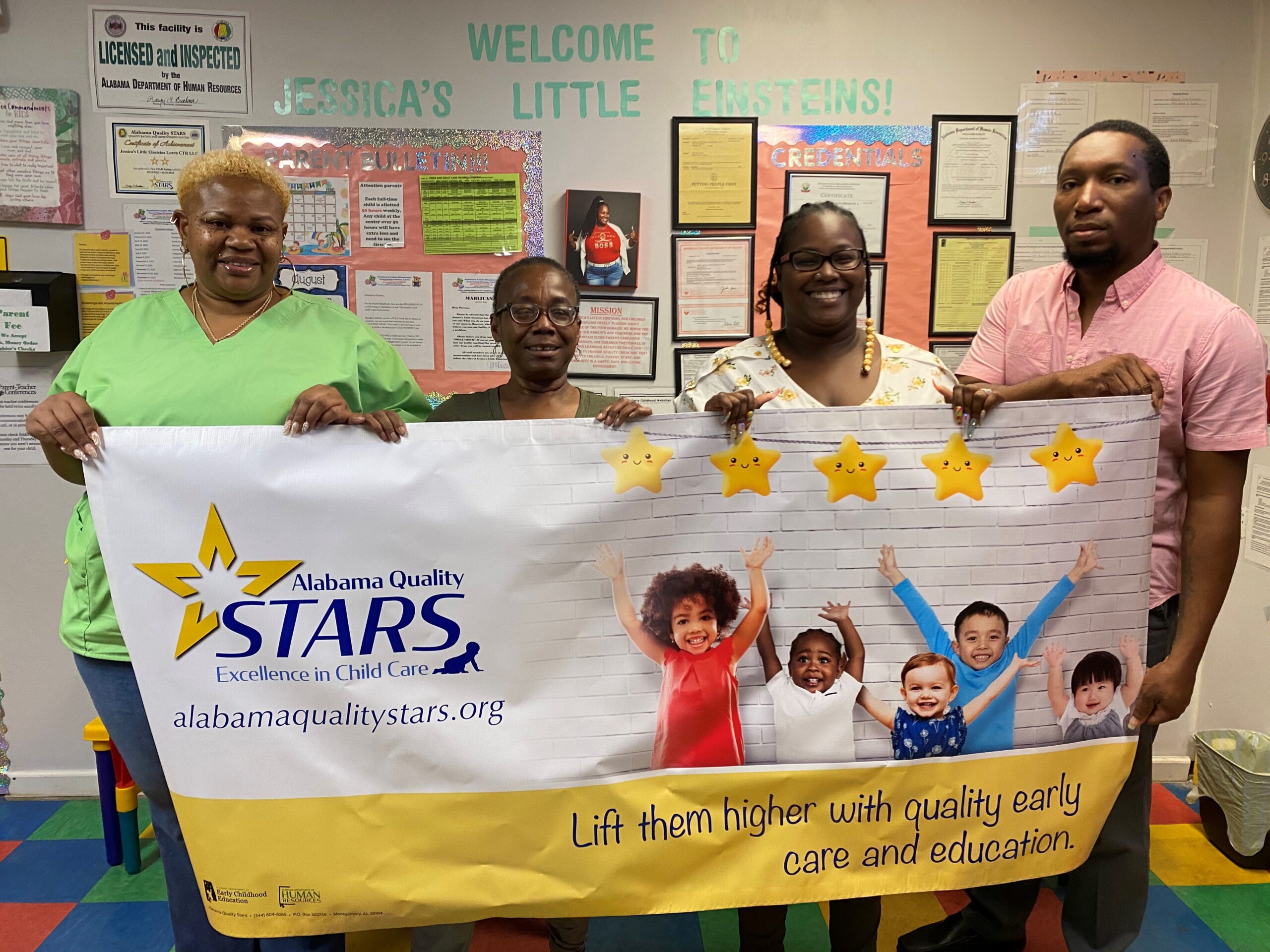 STAR Rated Provider holding their Alabama Quality STARS Banner